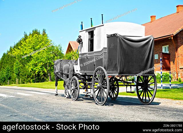 Wagon on road is shaded form primar background