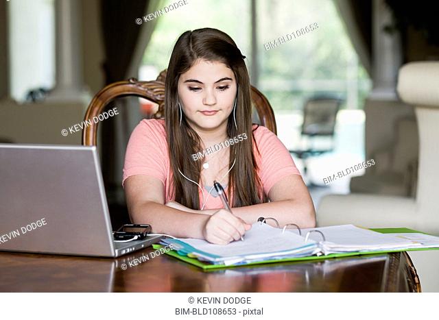 Caucasian girl doing homework