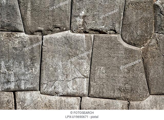 Sacsaywaman Inca ruins: detail of the massive stone wall fortifications, monochrome view, Sacred Valley, Cuzco, Peru