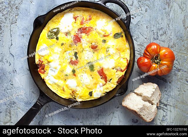 Oven baked tomato and cheese omelette
