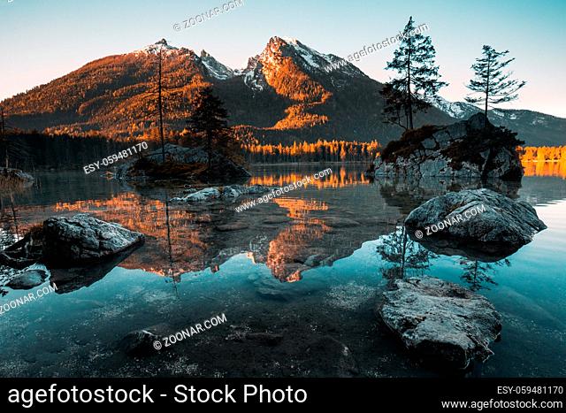 Wonderful Sunset at Hintersee Lake in Bavarian Alps. Awesome Alpine Highlands during sunrise. Amazing Autumn Natural Background from germany