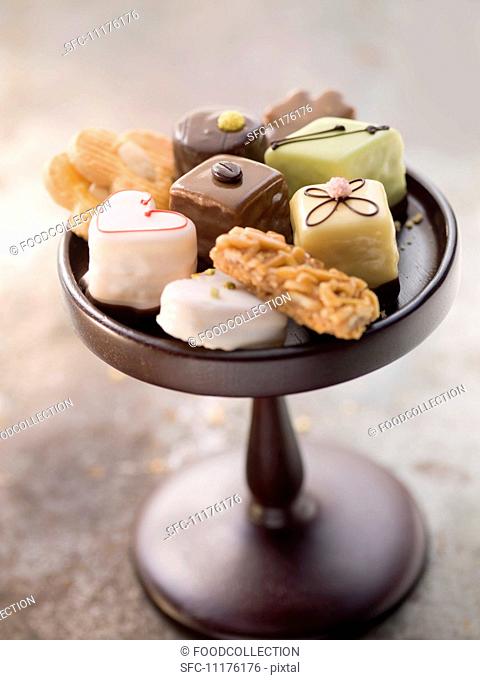 Assorted biscuits and petits fours on a cake stand