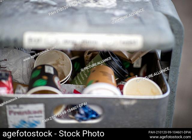 20 January 2021, Bavaria, Nuremberg: Used disposable coffee cups lie in a rubbish bin. Restaurants, bistros and cafés are to be obliged in future to also offer...