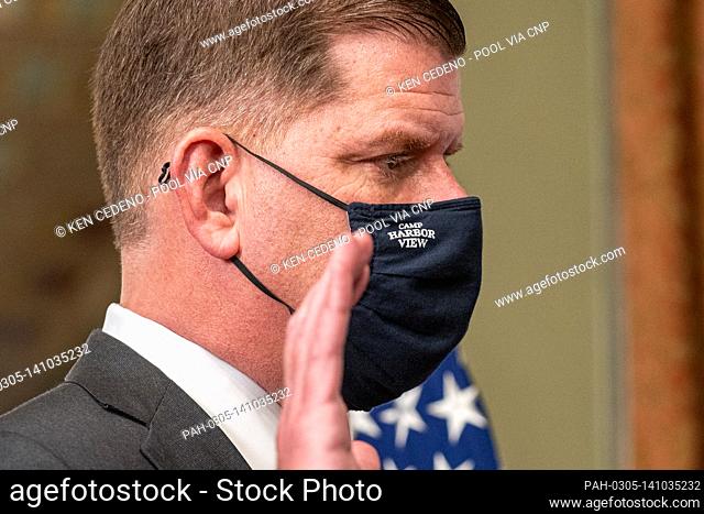 United States Vice President Kamala Harris ceremonially swears in Marty Walsh as Secretary of Labor in the Eisenhower Executive Office Building in Washington, U