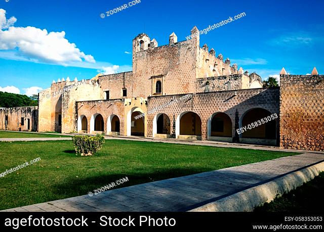 Facade of the Convent de San Bernardino de Siena with grass field in Valladolid, Yucatan, Mexico