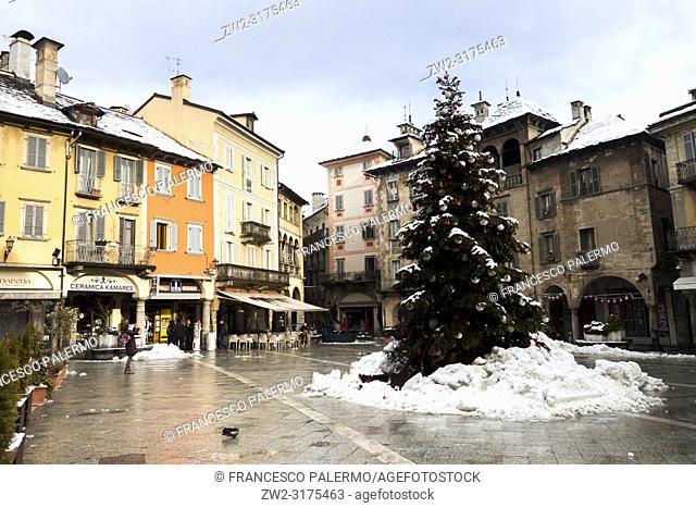 Christmas decorations at the Market Square after the snowstorm. Domodossola, Piedmont. Italy