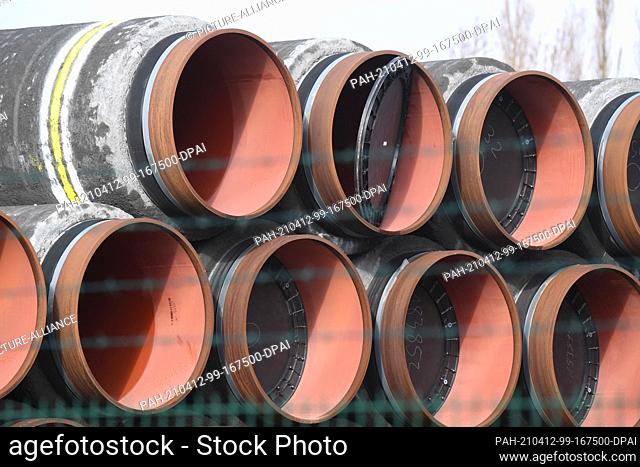 08 April 2021, Mecklenburg-Western Pomerania, Mukran: Pipes for the construction of the Nord Stream 2 natural gas pipeline from Russia to Germany are stored in...