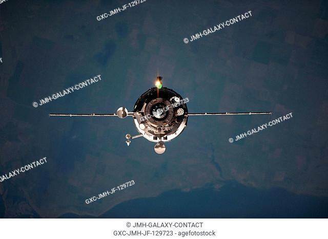 An unpiloted ISS Progress resupply vehicle approaches the International Space Station, carrying 2.8 tons of food, fuel and supplies