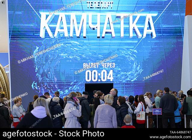 RUSSIA, MOSCOW - NOVEMBER 16, 2023: Visitors at a stand of Kamchatka during the Russia Expo international exhibition and forum at the VDNKh exhibition centre
