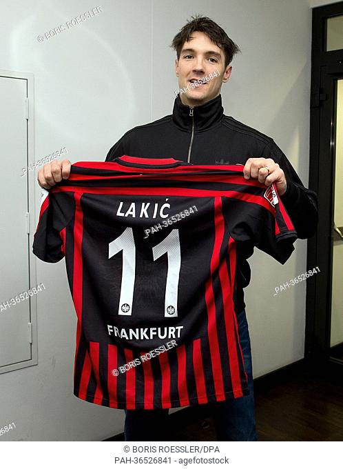 Striker Srdjan Lakic holds his new jersey for Eintracht Frankfurt in Frankfurt Main,  Germany, 29 January 2013. The Bundesliga club confirmed on 29 January 2013...