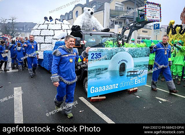 12 February 2023, Lower Saxony, Damme: Participants in the Damme Carnival street parade have dedicated their float to climate change under the motto ""Gaaaaanz...