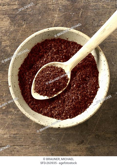 Sumac in bowl and on spoon