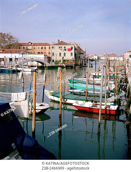 Boats docked on peaceful Giudecca Island, a peaceful residential island south of the main islands of Venice, Italy, Europe