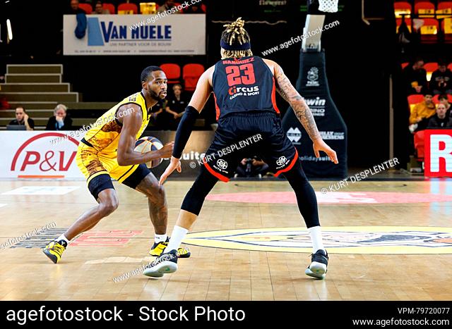 Oostende's Rube Nembhard and Oostende's Damien Jefferson fight for the ball during a basketball match between BC Oostende and Brussels Basketball