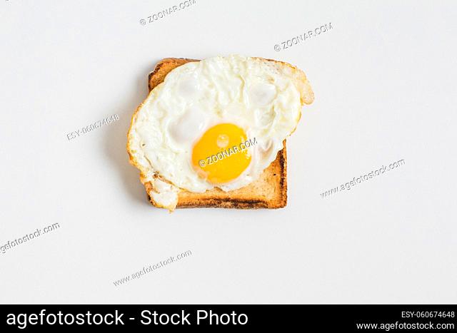 fried egg toast isolated white background