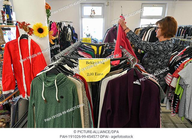 25 October 2019, Saxony, Dresden: Clothing for the cold season can be found in the clothing department of the Social Department Store