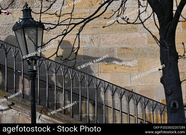 Shadows of people descending from Charles Bridge to Kampa on a sunny spring afternoon, 22 March 2023, Prague. (CTK Photo/Michal Kamaryt)