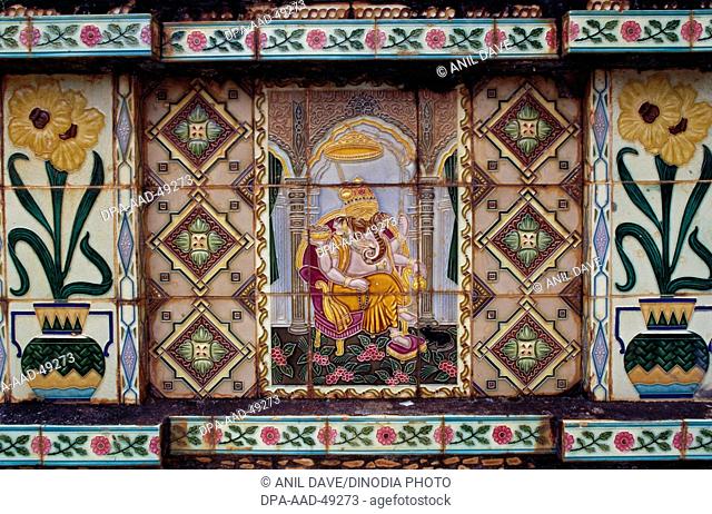 Painting of Ganesh ganpati God on Tulsi Vrindavan in Mangeshi Temple ; goa ; india