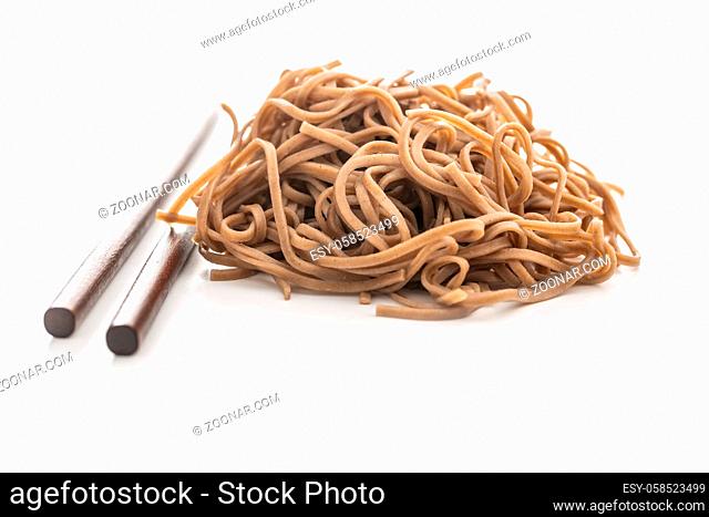 Cooked soba noodles. Traditional asian pasta isolated on white background