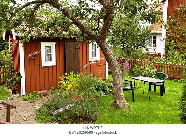 view into the garden of a typical swedish wooden residential house, Sweden, Smaland