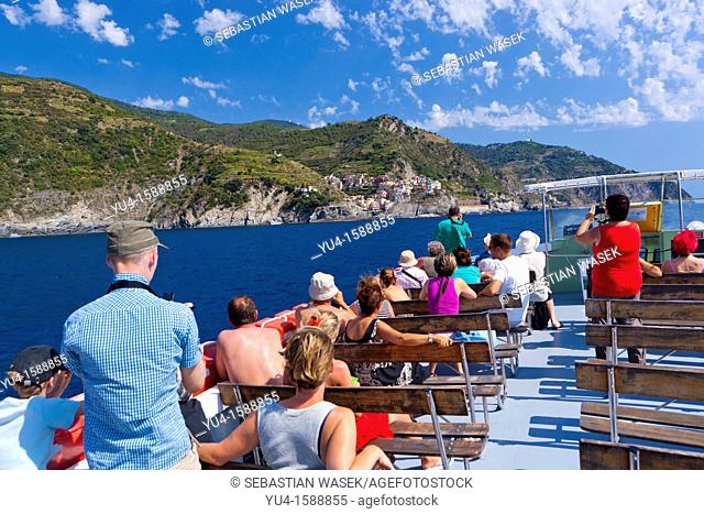 Boat with Tourist on way to Manarola, Cinque Terre, UNESCO World Heritage Site, Liguria, Italy, Europe