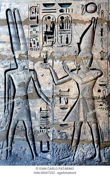 Medinet Habu, Luxor, Egypt, Djamet, mortuary temple of King Ramses III, XX dyn. 1185 -1078 B.C., : the king offers an image of goddess Maat to god Amon-Ra