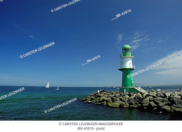 Lighthouse at the entry to Rostok harbour at Warnemuende Germany