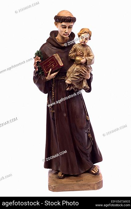 Close up view detail of a ceramic monk holding a child, isolated on a white background