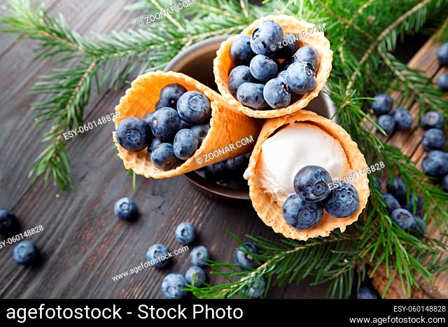 Ice cream flavor in cones blueberry. Summer and Sweet menu concept