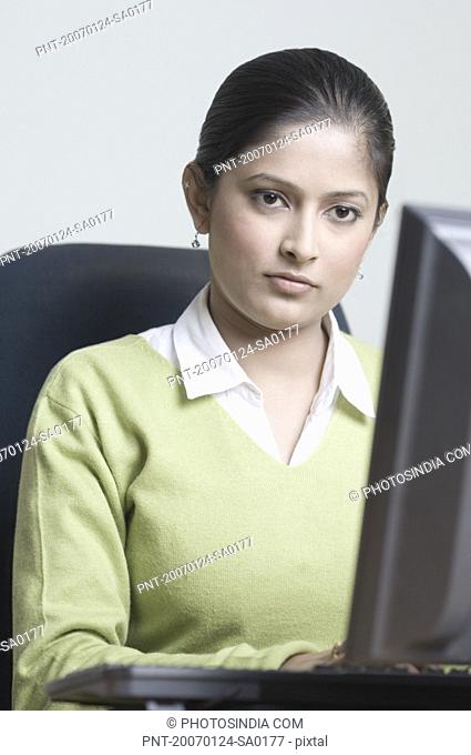 Businesswoman working on a computer