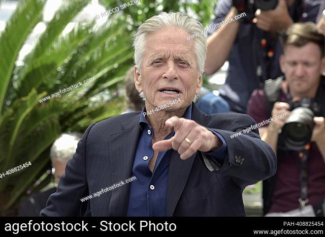 CANNES, FRANCE - MAY 16: Michael Douglas attends a photocall as he receives an honorary Plme D'Or at the 76th annual Cannes film festival at Palais des...