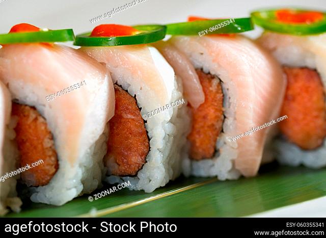 Close up of sushi on a white plate