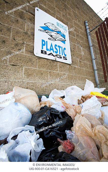 Plastic bags in a recycling bin. Plastic bags in a recycling bin, Santa Monica, Los Angeles, California, USA