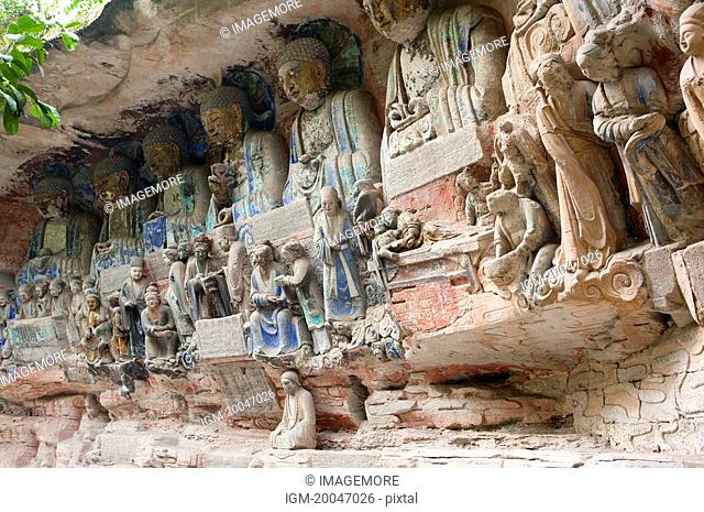 Stone Carving, depicting a Buddhist story from the Scripture on the Kindness of Parents, The Dazu Rock Carvings, Chongqing, China