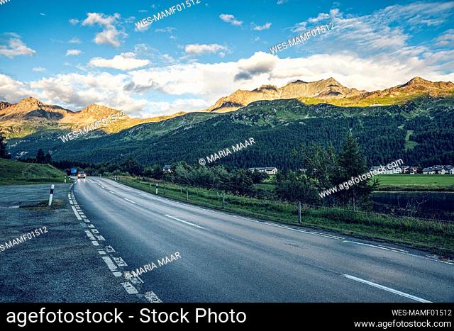 Asphalt road in Engadin valley