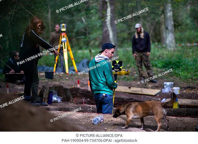 03 September 2019, Saxony-Anhalt, Harzgerode: Archaeology students search at the excavation site ""Wüstung Anhalt"" for remains of the disappeared village
