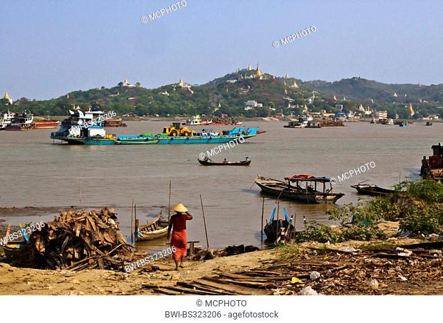boat traffic on the Irrawaddy River with Sagaing hill behind, Burma, Mandalay