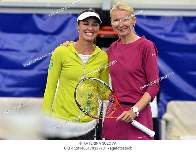 Former world no. 1 Martina Hingis (left) of Switzerland and Wimbledon winner Jana Novotna of Czech Republic are seen during the friendly tennis match within the...