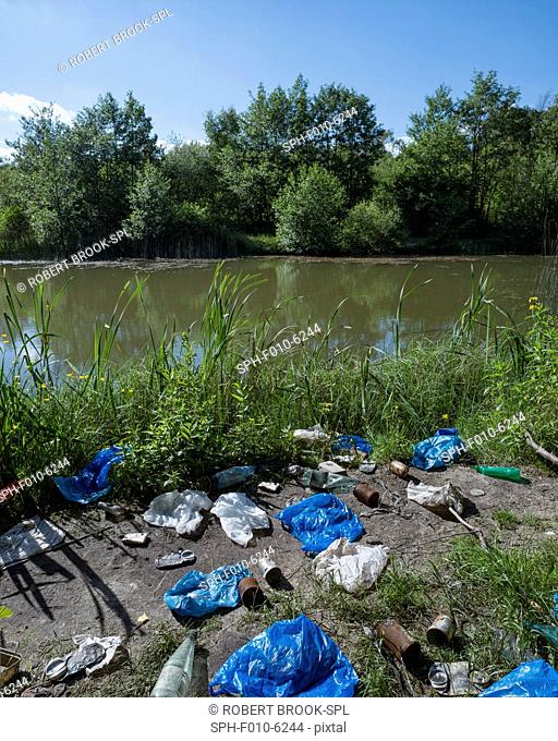 Packaging, tins and other discarded items next to lake situated in urban area. Composite image