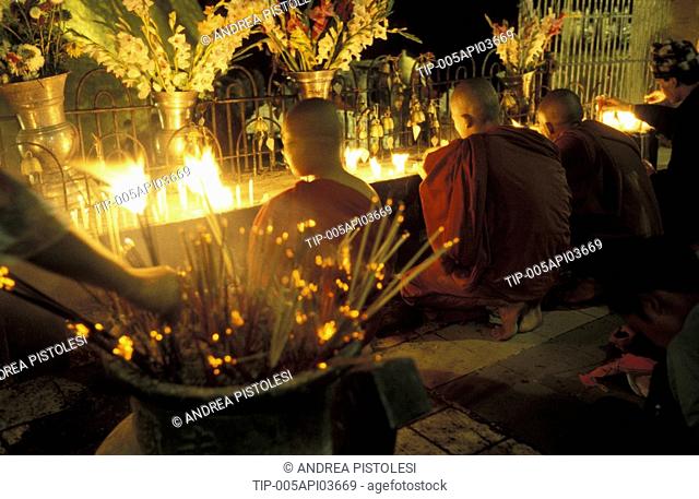 Burma, Myanmar, Kyaikto, Kyaik-tiyo Pagoda The Golden Rock, monks praying