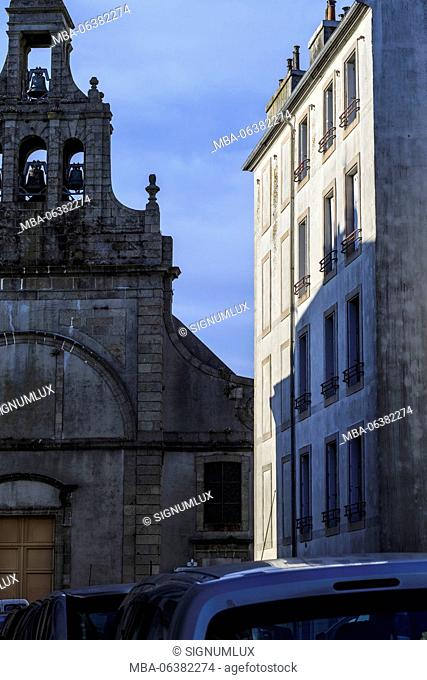Europe, France, Brittany, Brest, 'Eglise Saint-Sauveur' and modest residential house