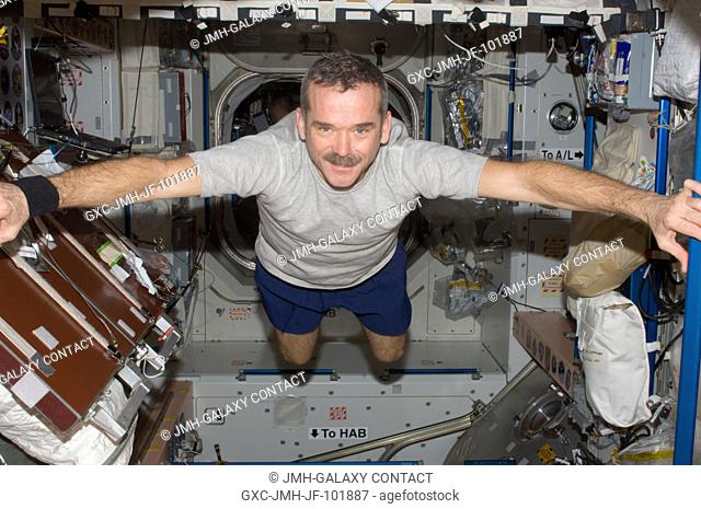 Canadian Space Agency astronaut Chris Hadfield, Expedition 34 flight engineer, floats freely in the Unity node of the International Space Station