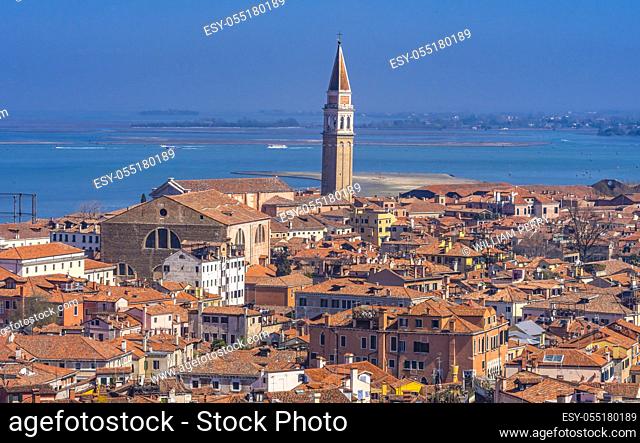 Beautiful orange roofs and neighborhoods, houses and churches in Venice Italy