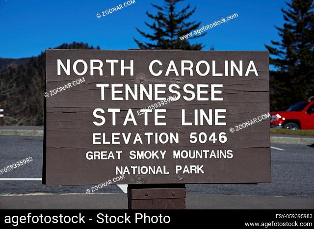 Tennessee - North Carolina state line. The sign in Smoky Mountains by Appalachian Trail