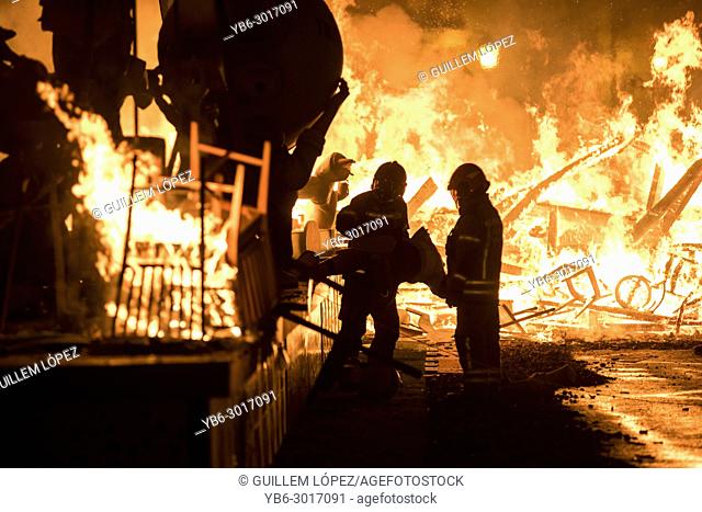 Firefighters at work during the night of ""La Crema"" the burning at the Valencian town hall square as part of the last day of las Fallas festival in Spain