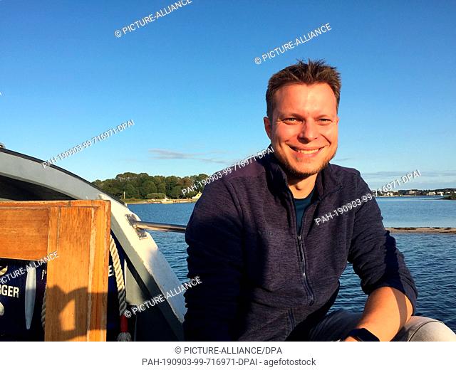 21 August 2019, Schleswig-Holstein, Flensburg: The Nabu expert Jan Langmaack sits on board the excursion ship ""Flora II""
