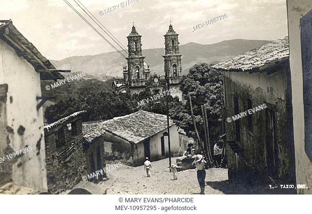 View of Taxco de Alarcon, Guerrero, Mexico, with the two towers of Santa Prisca church in the centre
