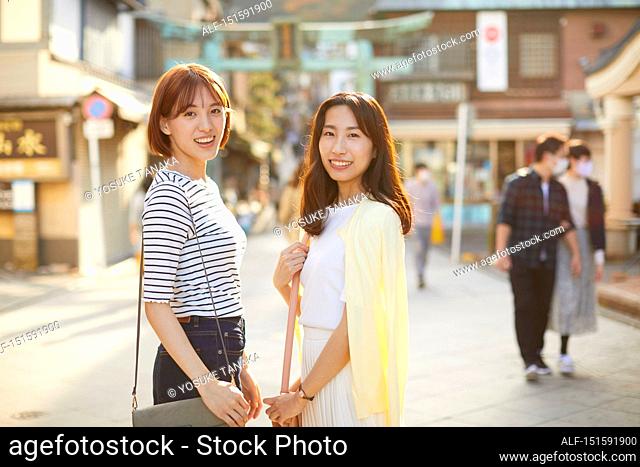 Young Japanese women at a shopping street