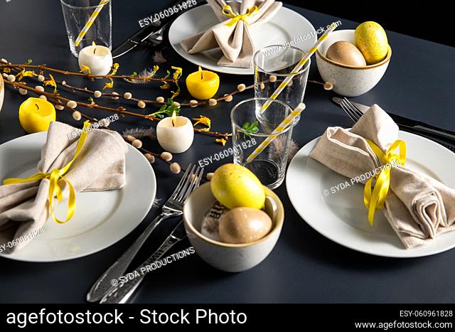 close up of easter table serving over black
