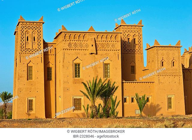 Tower of a kasbah with many ornamental decorations, mud brick fortress of the Berber people, Tighremt, Ouarzazate, southern Morocco, Morocco, Africa